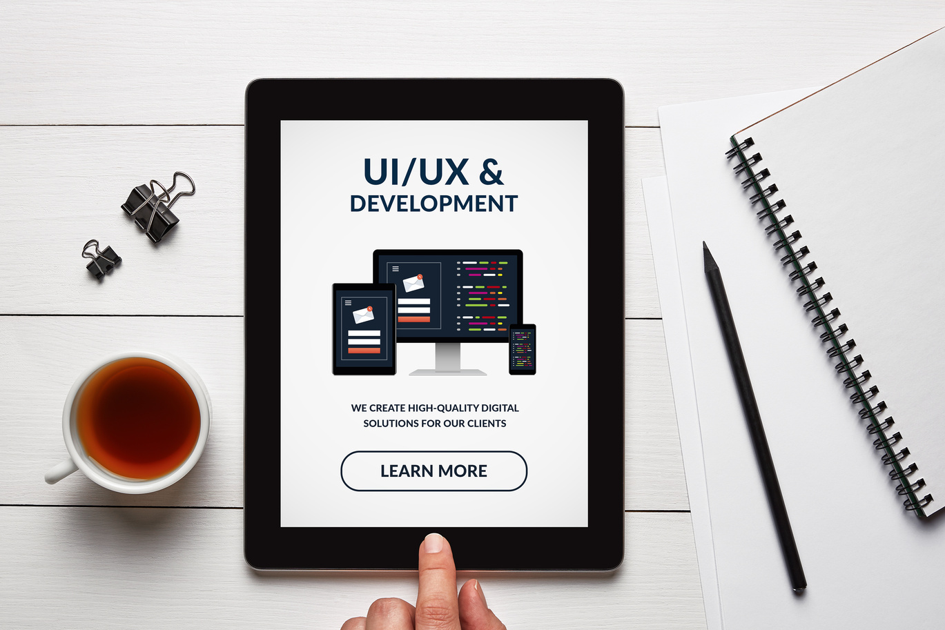 UI/UX design and development concept on tablet screen